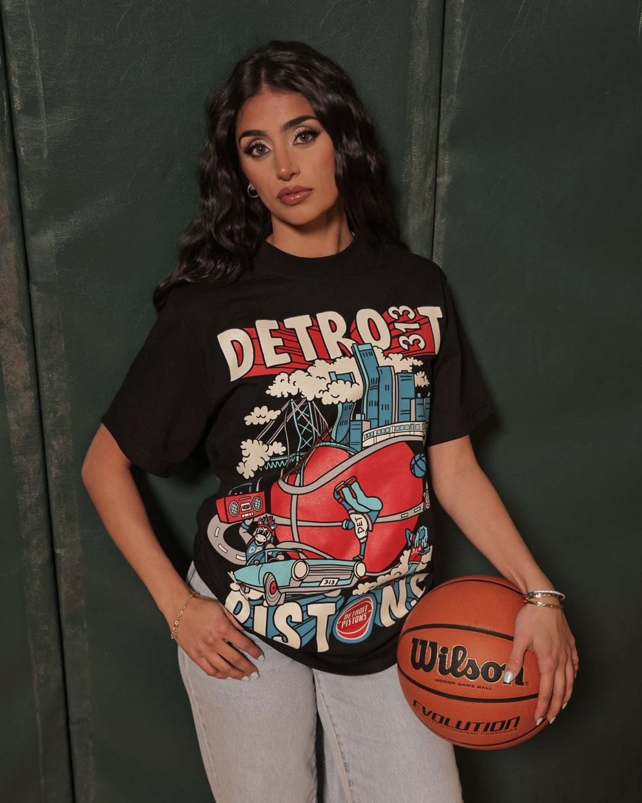 Juliana Rabban, Detroit artist and founder of Just by Juliana, wearing one of her original apparel designs.
