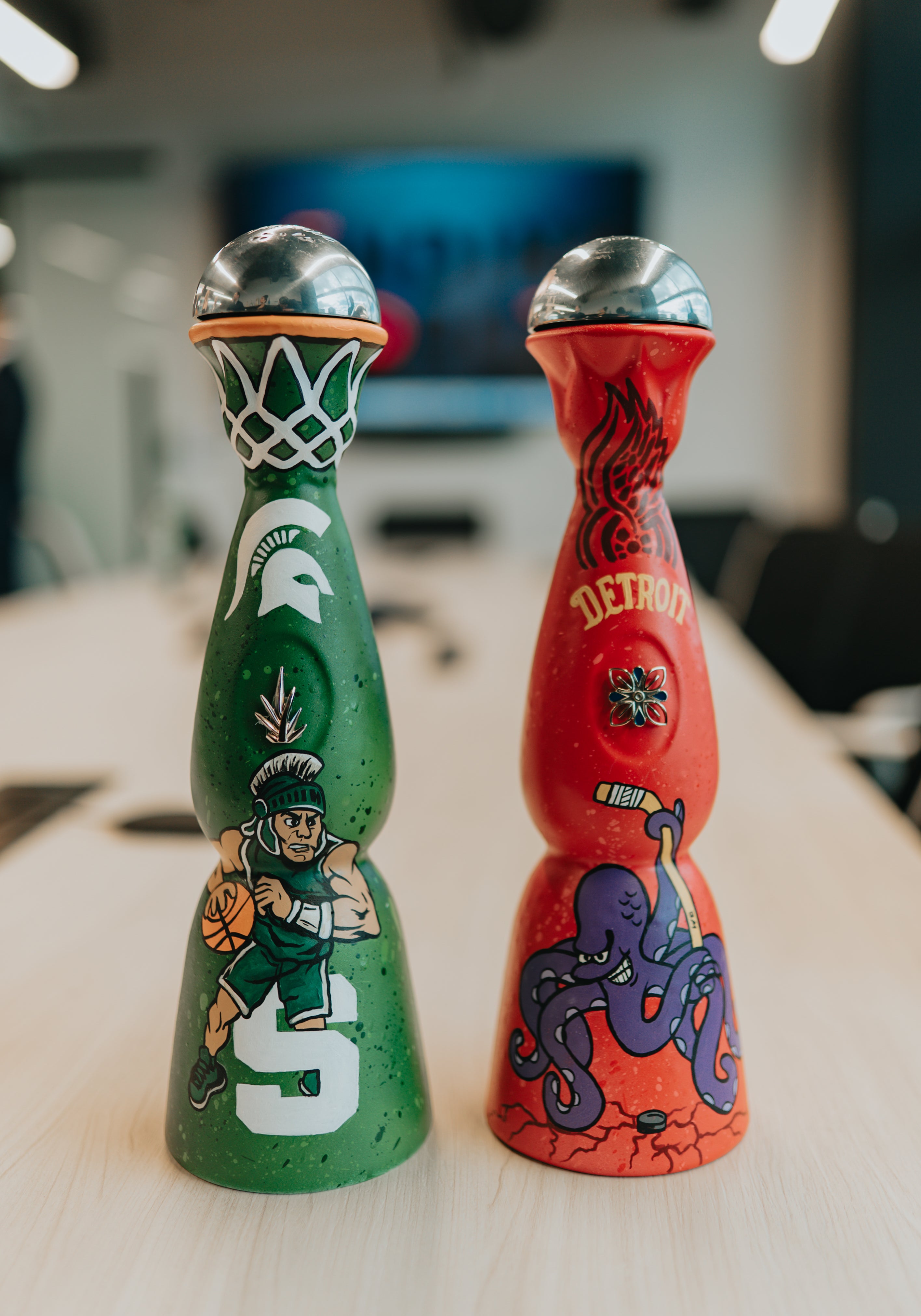 Custom hand-painted tequila bottle with Michigan State Spartan theme created as a personalized gift by Just by Juliana