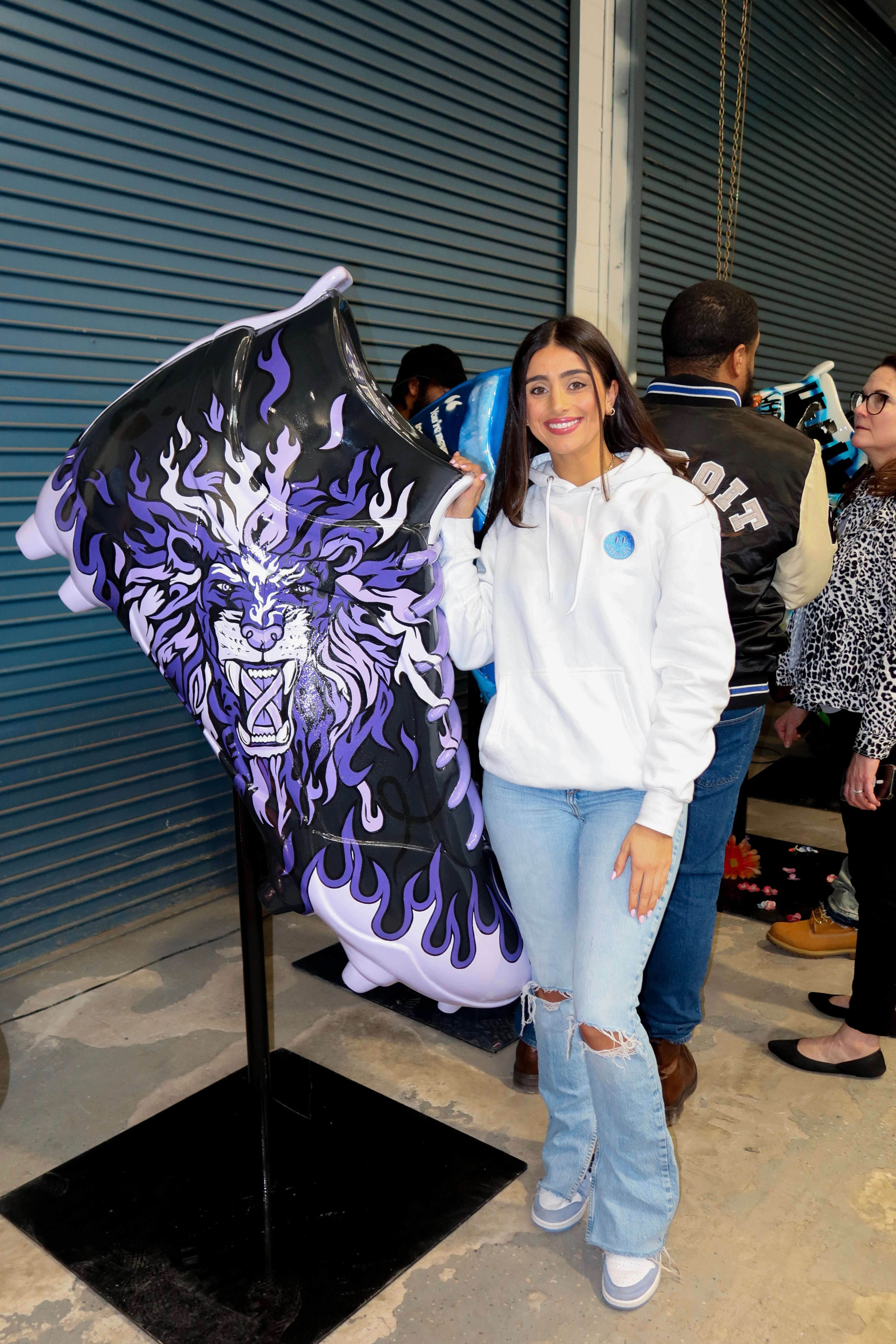 Giant custom painted cleat sculpture created for the NFL Draft by Just by Juliana