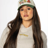 Forest Green Sport City Detroit hat worn as streetwear apparel by Just by Juliana