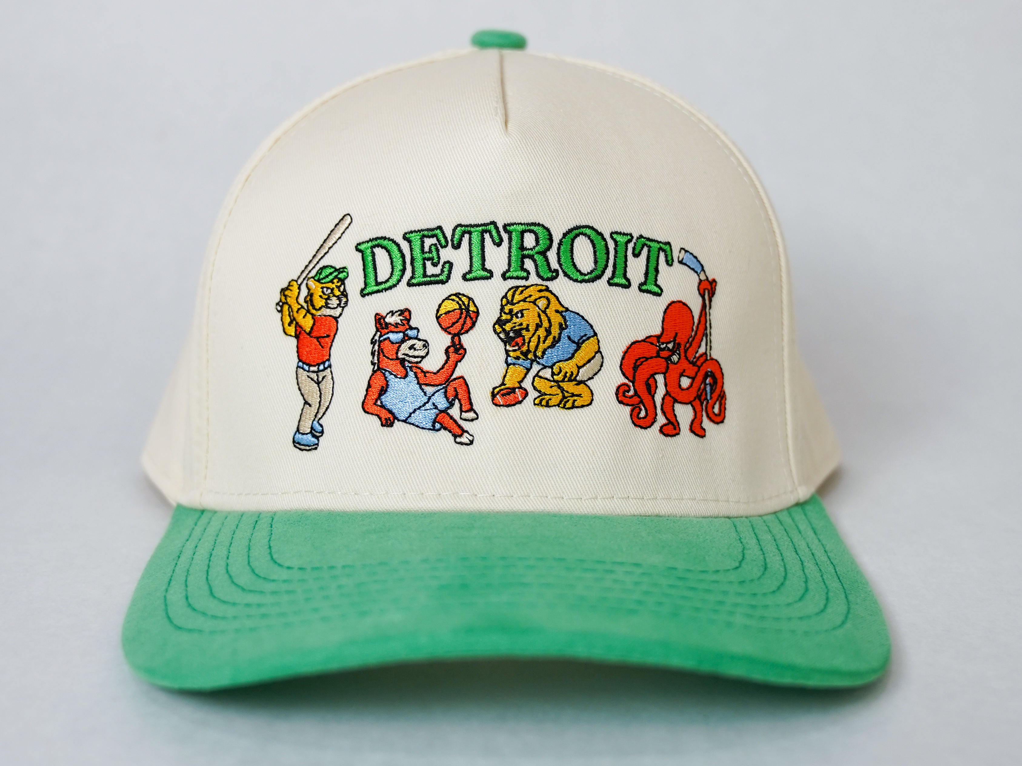 Front view of Kelly Green Sport City Detroit wearable art hat by Just by Juliana