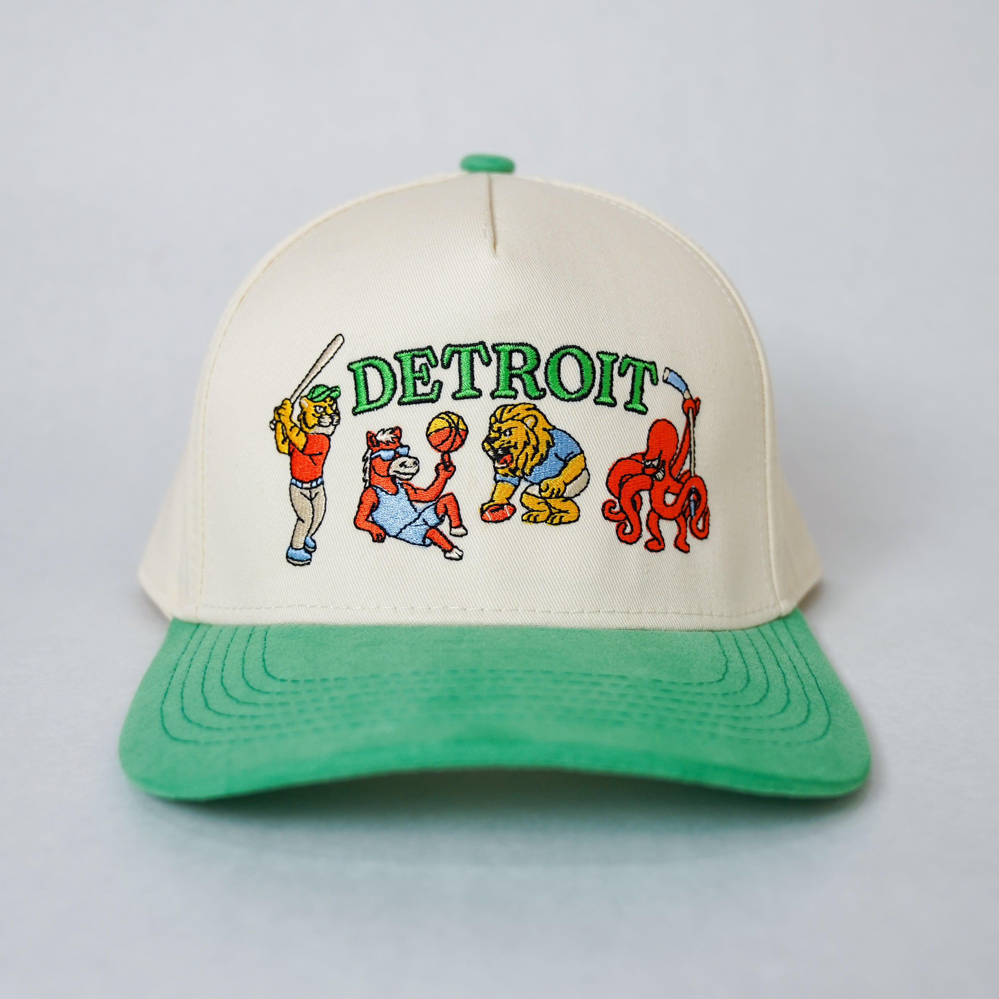 Front view of Kelly Green Sport City Detroit wearable art hat by Just by Juliana