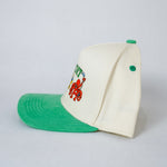 Side view of Kelly Green Sport City Detroit wearable art hat by Just by Juliana