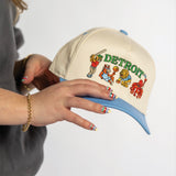 Light blue Sport City hat featuring Detroit-inspired wearable art design by Just by Juliana