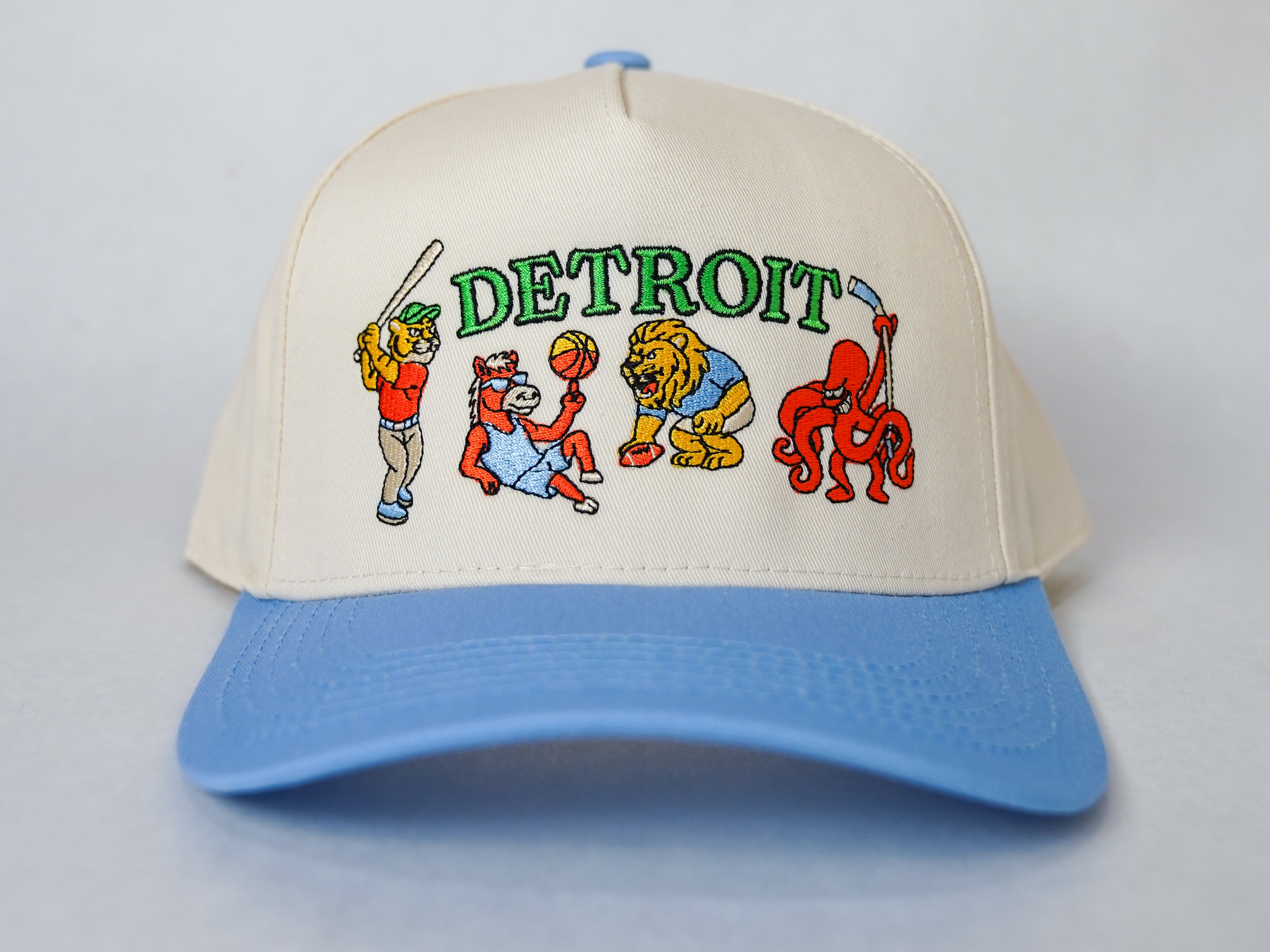 Front view of Light Blue Sport City Detroit wearable art hat by Just by Juliana